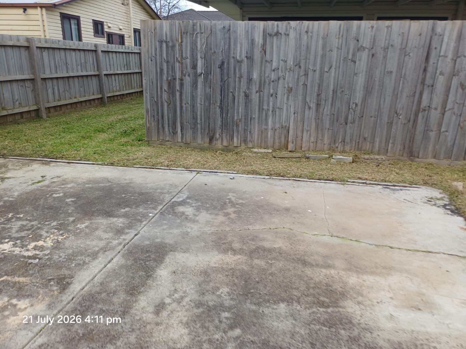 Yard cleared and levelled, ready for new turf