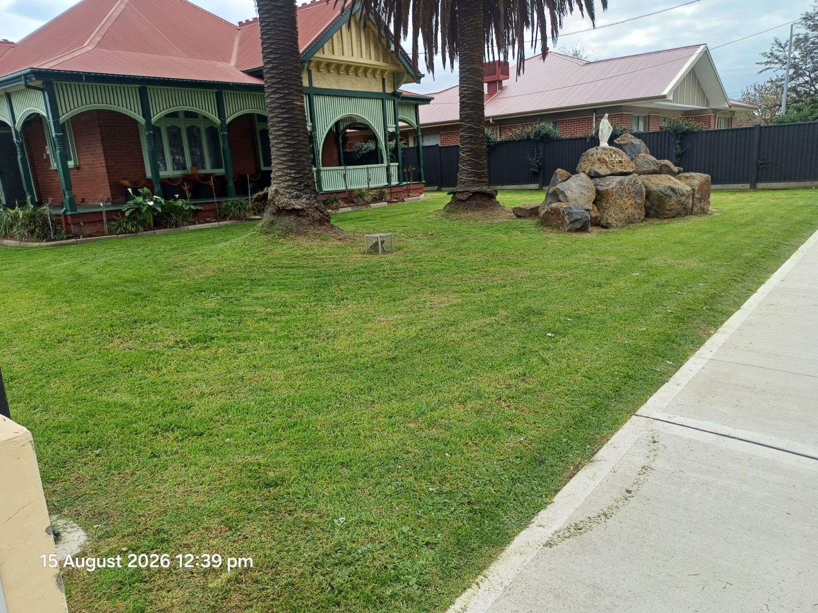 Freshly mowed lawn with garden feature