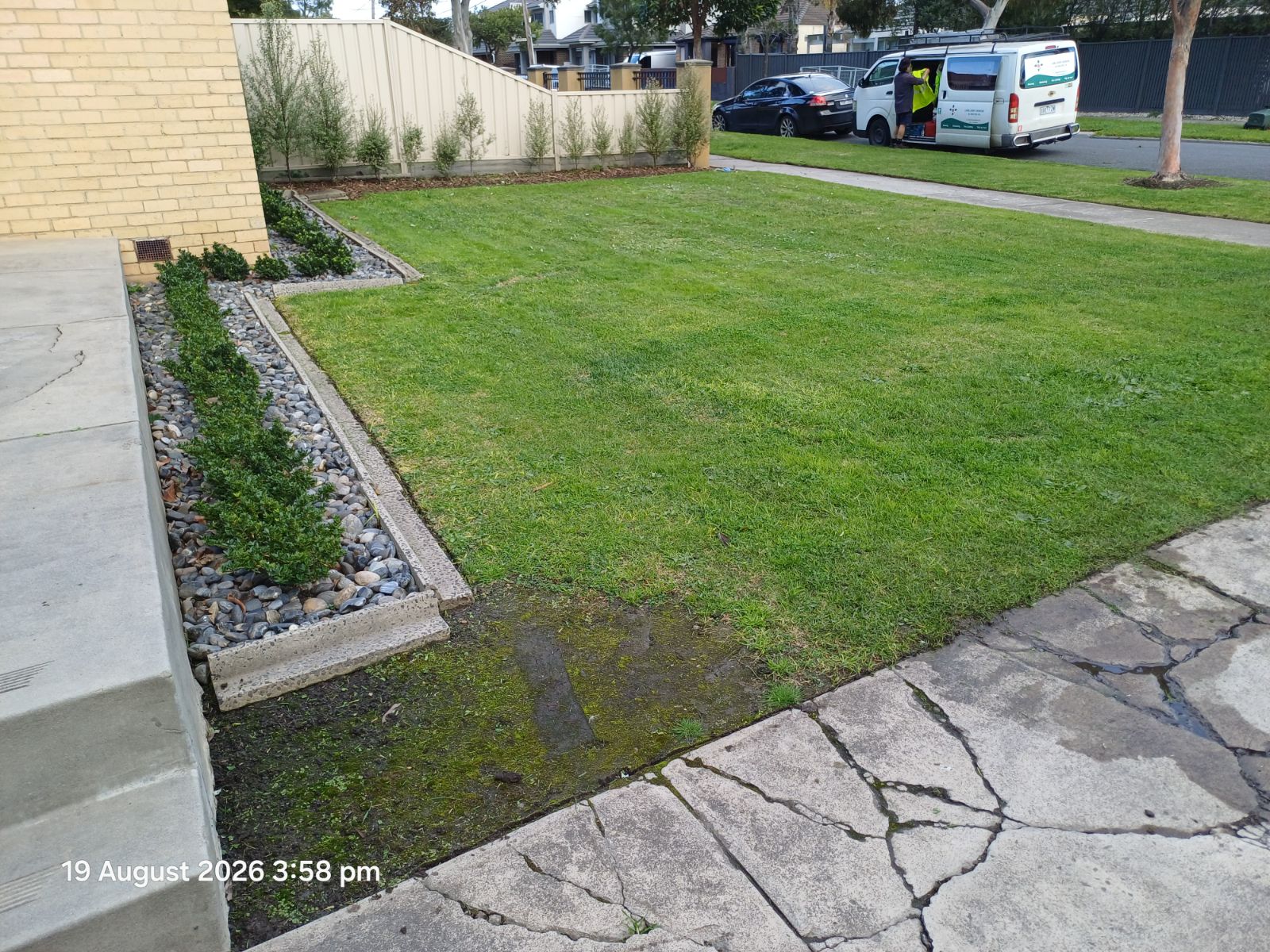 Long John's Mowing van servicing a nature strip