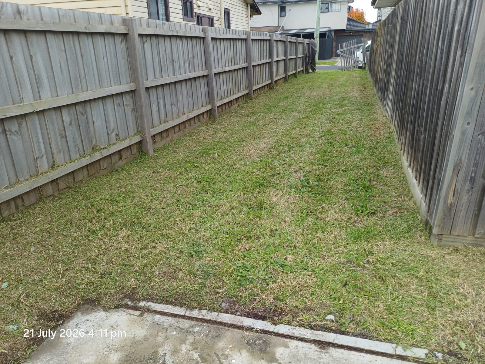 Same laneway neatly mowed after service